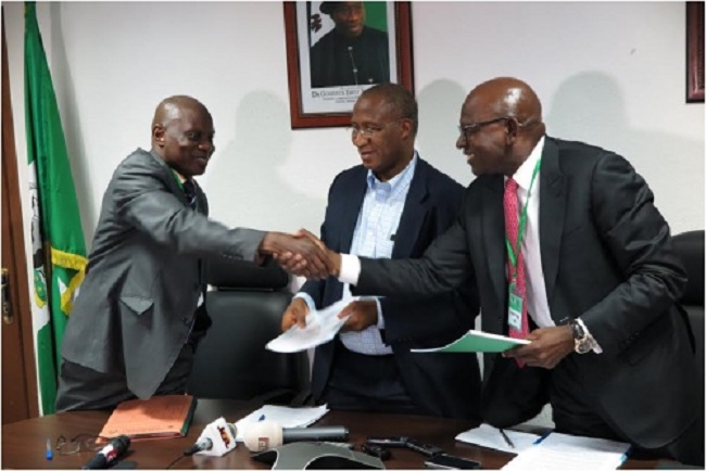 L -R: Mr. Suleiman Shuaibu, Acting D-G of the Directorate of Technical Cooperation in Africa (DTCA); Mr. Ousmane Dore, Resident Representative, African Development Bank Group, Nigeria country office; and Mr Roberts Orya, MD/CEO Nigerian Export-Import at the signing of Nigerian Technical Cooperation Fund (NTCF) financial grant of US$302,000 to NEXIM Bank for the Sealink Project at the AfDB Offices in Abuja, February 26, 2015.