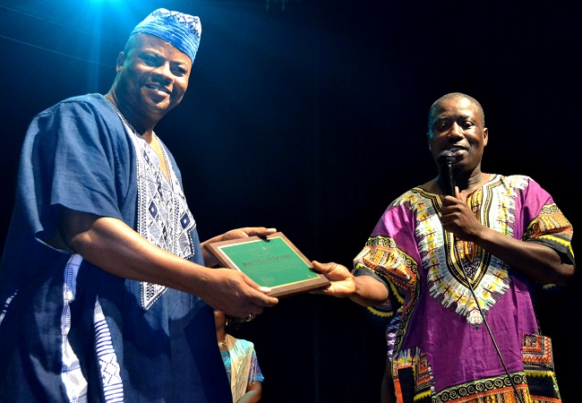 Author and artist Fasuekoi is excited as he receives award from the LNCA of the USA, the first in 33 years since he first joined the Liberian Cultural Ambassadors based in Liberia  