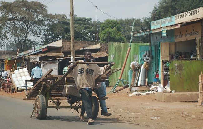 A young labourer on his way to the same Nairobi market where Sawiya thinks Rashid and his brother disappeared. Credit: Erik Hersman