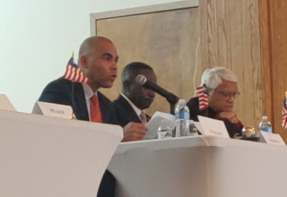 Michael Mueller (first from left), Vice Chairman of the Board of the European Federation of Liberian Associations and Co-Chairman the All Liberian Conference for Dual-Citizenship, speaks at the conference in Silverspring, Maryland, USA, on December 7 Photo: Front Page Africa